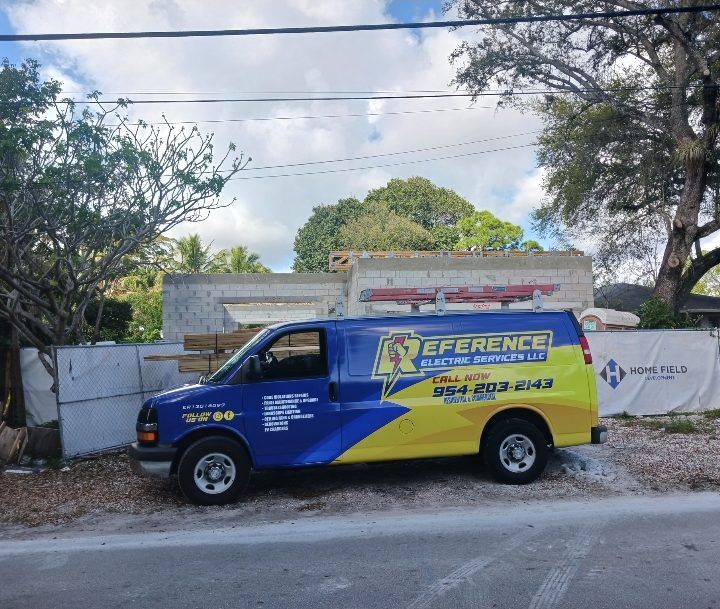 Reference Electric service van parked at a residential job site