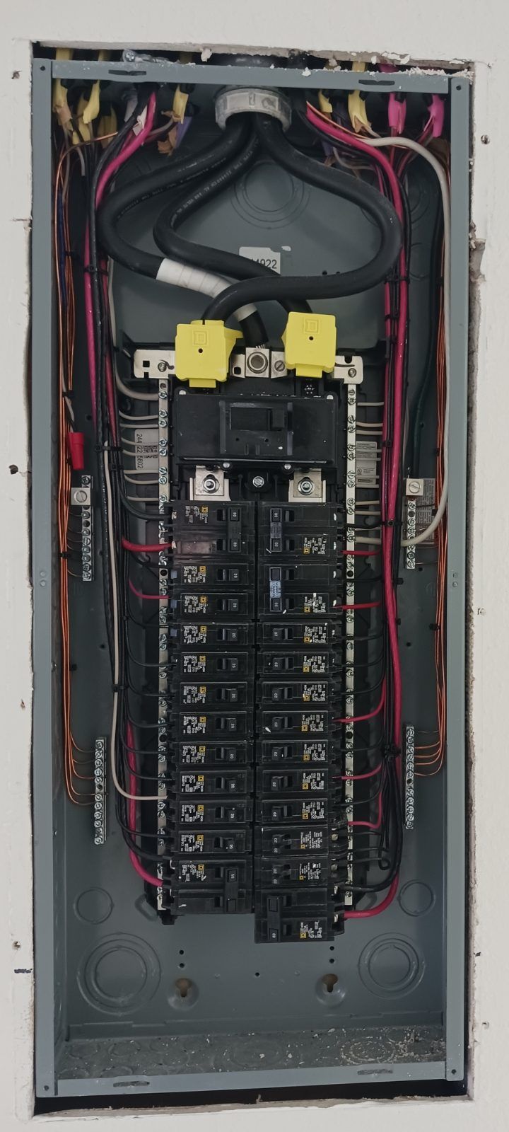 Finished residential breaker panel with every circuit neatly labelled